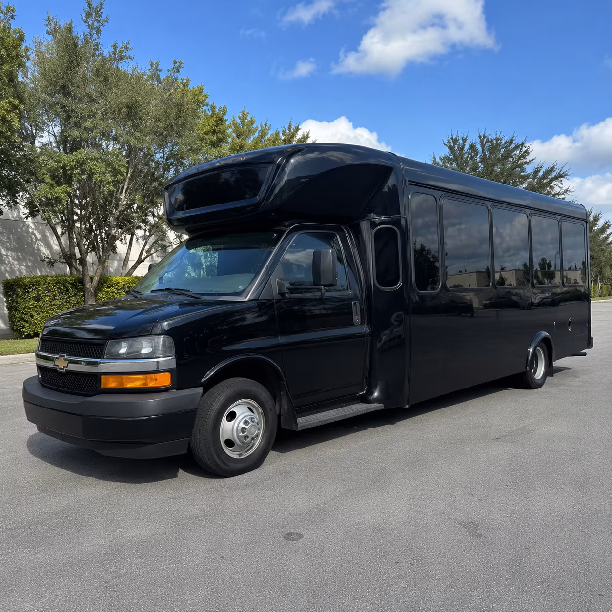 Wedding guests seated inside a party bus serving Provo